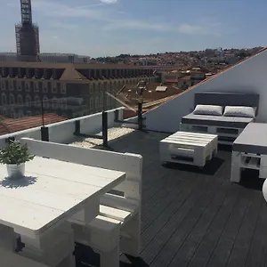 A Terrace On A Topfloor With A View Lisboa